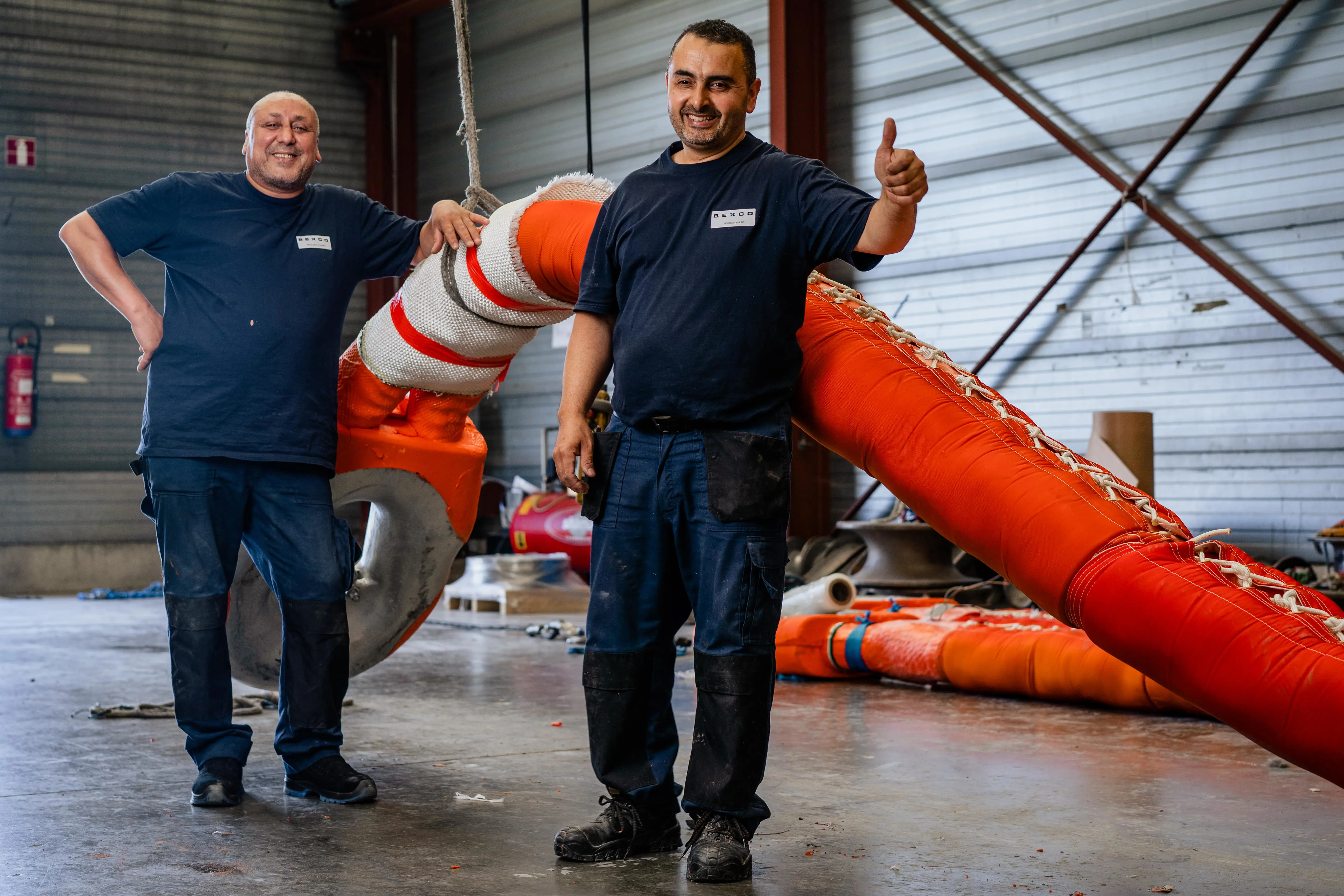 men giving a thumbs up